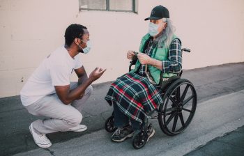 Nurse and woman in a wheelchair