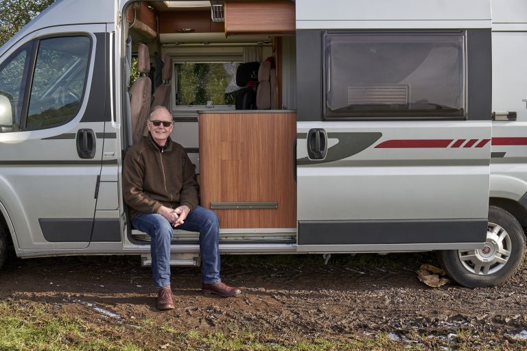 Older man in a camper van